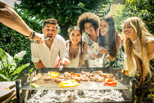 Barbecue Bliss: AI-Generated Artwork Bringing to Life a Joyful 4th of July Gathering, Where Friends Relish Both the Culinary and Social Delights.