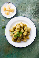 Traditional potato gnocchi with pesto sauce