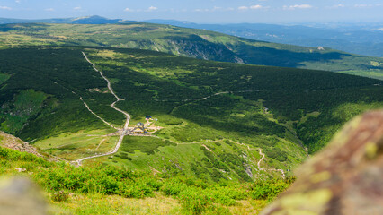 Giant Mountains, mountain panorama from the hiking trail to the top of Sniezka. View of the vast...