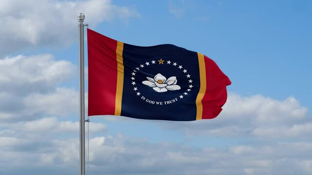 Mississippi US state looped flag waving in the wind with blue sky and running clouds, cycle seamless loop video