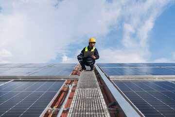 Service engineer checking solar cell on the roof for maintenance if there is a damaged part. Engineer worker install solar panel. Clean energy concept.