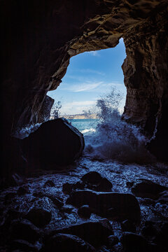 Inside a cave looking out to the ocean