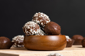 Chocolate candies with coconut flavor and filling