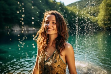 Obraz premium Environmental portrait photography of a joyful girl in his 30s wearing a glamorous sequin top at the plitvice lakes national park croatia. With generative AI technology