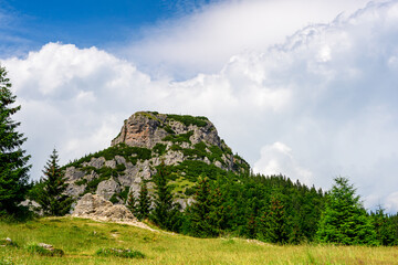 Mala Fatra National Park, Kis-Rozsutec, Maly Rozsutec mountain peak, view from the glade below the peak during trekking on a summer sunny day.