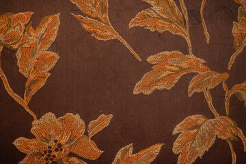 Textura de tela de hojas y flores color café estilo antiguo 