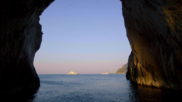 Faraglioni, Capri Island, italy under arch