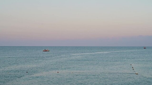 Beautiful sundawn scene on Alanya beach with view to famous Alanya island, in Turkey