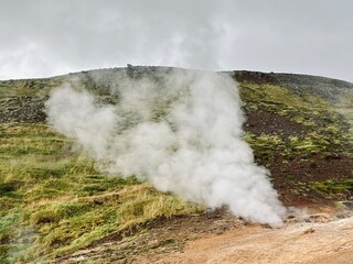 Mossy and wetland terrain of Reykjadalur Valley, Iceland. Valley is known for its mudpots, soda springs and geothermal activity.