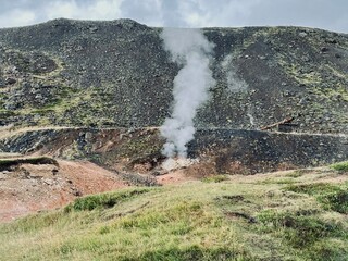 Mossy and wetland terrain of Reykjadalur Valley, Iceland. Valley is known for its mudpots, soda springs and geothermal activity.