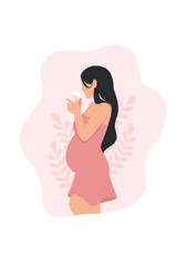 A pregnant woman drinking milk, side view