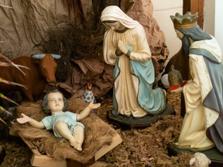 Fototapeta na wymiar Traditional Christmas nativity scene with colorful figures