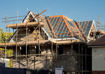 Europe, UK, England, Surrey, scaffolding house roof renovation