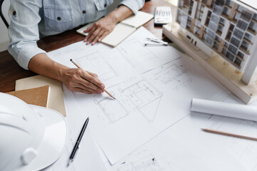 Interior architect working with blueprint planning in modern office, engineering concept. .