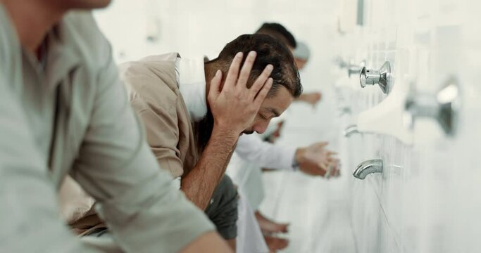 Muslim, religion ritual and men washing before prayer in bathroom for purity, and cleaning. Islamic, worship and faith of group of people with wudu together at a mosque or temple for holy practice