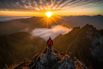 Hiker stands at the summit of a difficult mountain climb to be greeted with a beautiful view of the sunrise.Created with generative A
