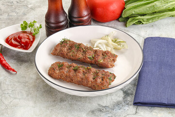 Kebab with beef served onion