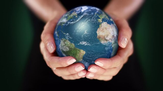 Female Hands Holding 3D Spinning Hyper Realistic Planet Earth. Environmental Conservation, Save the Planet, Ecology, Sustainable Lifestyle. World Earth Day. Loopable from frame 48 to frame 497.