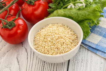 Raw sesame seeds in the bowl