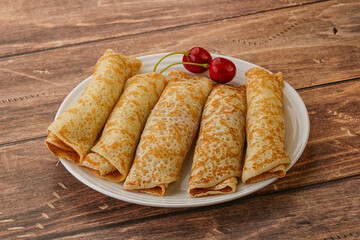Sweet and tasty pancake with cherry