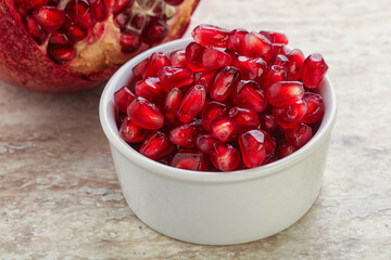 Ripe red Pomegranate seeds in the bowl