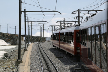 Famous electric red tourist train,  Zermatt, Valais region, Switzerland, Europe