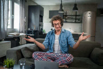 One man caucasian male freelancer work from home on laptop computer