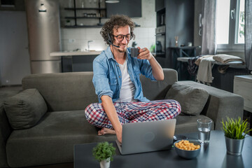One man caucasian male freelancer work from home on laptop computer