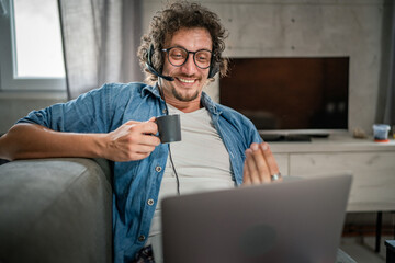 One man caucasian male freelancer work from home on laptop computer