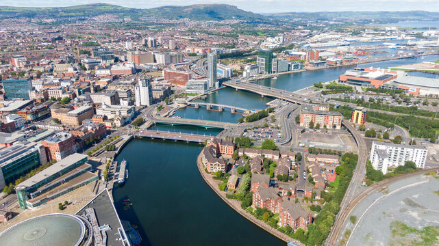 Aerial view on buildings and Lagan River in City center of Belfast Northern Ireland. Drone photo, high angle view of town