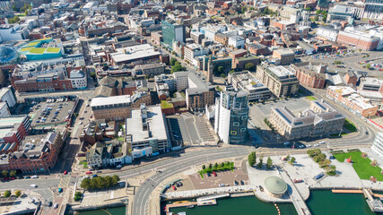 Aerial view on buildings and Lagan River in City center of Belfast Northern Ireland. Drone photo, high angle view of town