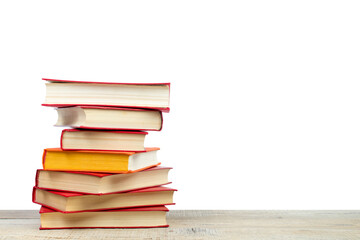 Composition with hardcover books, fanned pages, isolated on white background. Back to school. Copy Space. Education background.