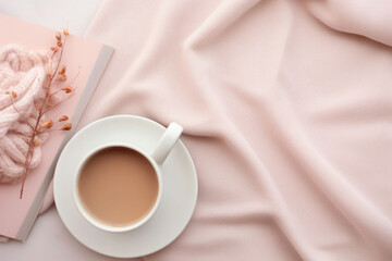 Top view of a planner, a mug of coffee and a woolen scarf in pink colors. Generative AI