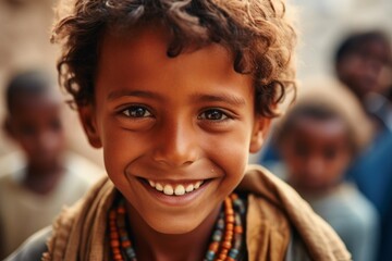 Close-up portrait photography of a happy boy in his 30s wearing a rugged jean vest at the socotra island in yemen. With generative AI technology