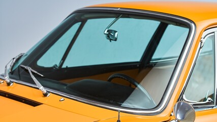 Windshield wipers on a orange car
