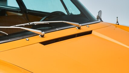 Windshield wipers on a orange car