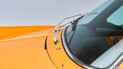 Windshield wipers on a orange car