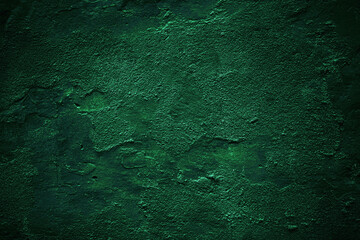 Black dark jade emerald green grunge background. Old painted concrete wall. Plaster. Close-up....