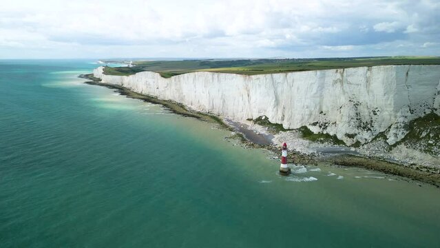 Seven Sisters Cliff Coastline with Lighthouse in United Kingdom