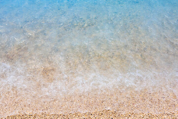 Seashore of small white pebbles on the beach in Oludeniz, blue lagoon. The cleanest beach with blue flag. Background