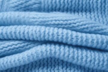 Soft cozy knitted blue blanket textured background