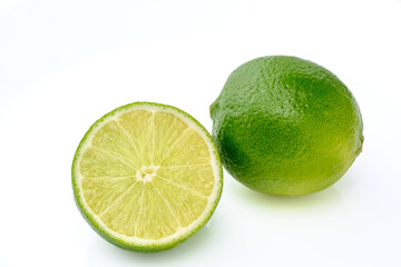 fresh juicy limes on white background