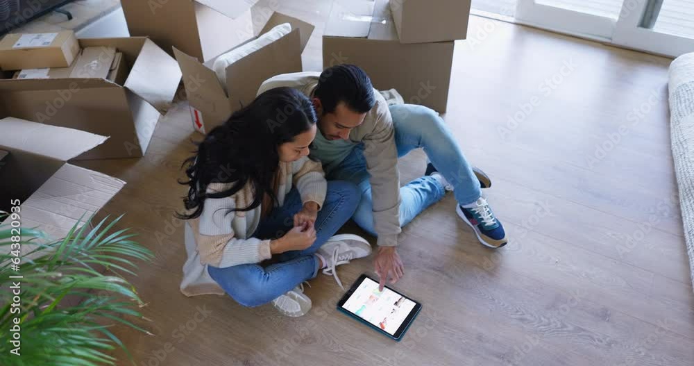 Poster Happy couple, tablet and boxes in new home, renovation or interior planning together on floor above. Top view of man and woman on technology for moving in, house or check online furniture on property