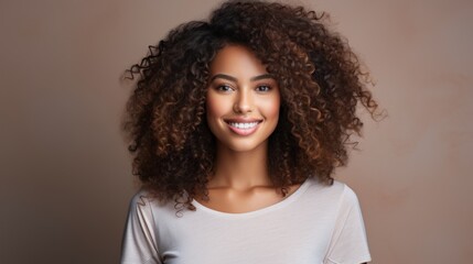 Smiling beautiful woman with curly hair