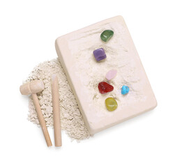 Excavation kit on white background, top view. Educational toy for motor skills