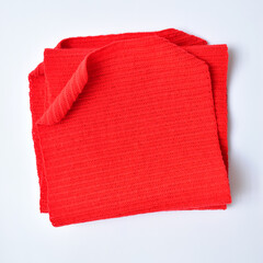 red wool knitted yarn texture, woolen fabric on white background
