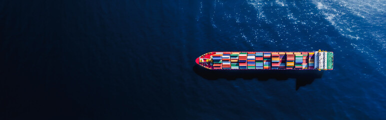 Aerial view of container ship  in the ocean - Copy space.