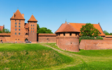 View of largest medieval brick Castle of Teutonic Order in Malbork, Poland .