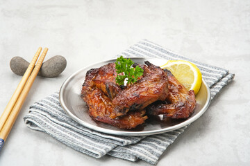 Roasted chicken wings with honey and spices 
