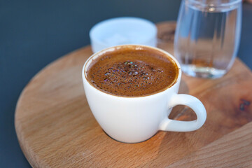 a cup of turkish coffee on table 